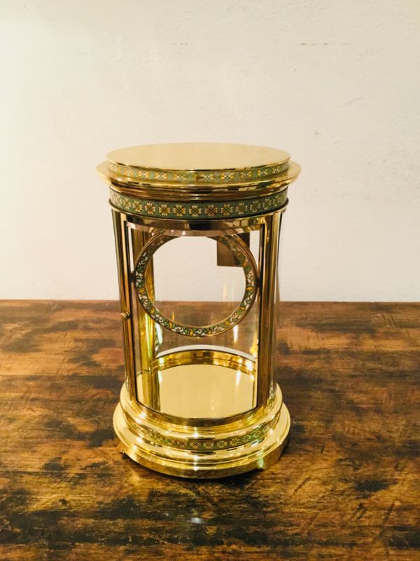 Antique brass and glass case after restoration, showcasing its restored brilliance by Chelsea Plating Company.